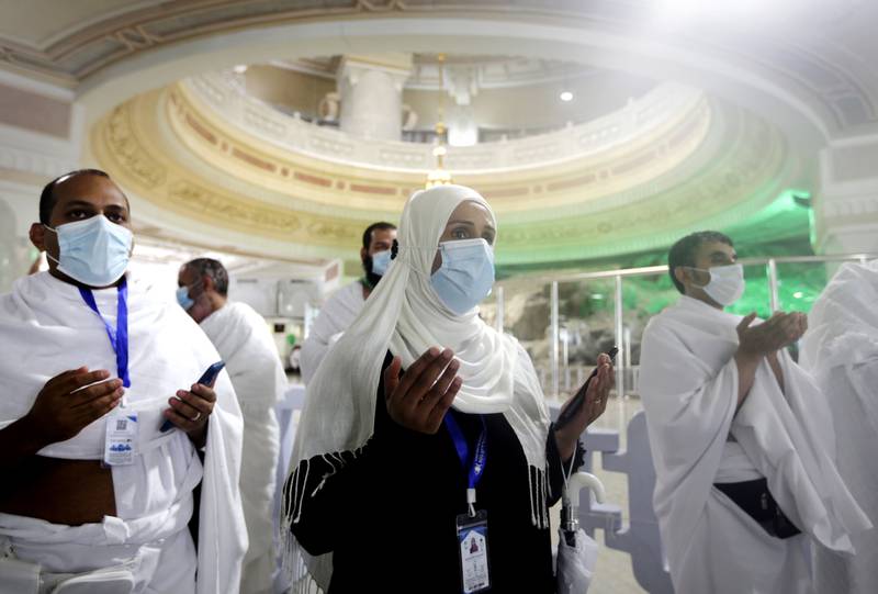 Muslim pilgrims pray at the Grand Mosque.