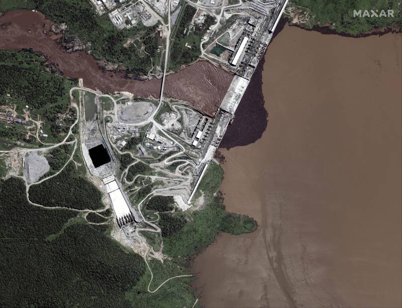 This handout satellite image obtained courtesy of  Maxar Technologies on July 21, 2020 shows a view of northwestern Ethiopia that focuses on the status of the Grand Ethiopian Renaissance Dam (GERD) and the Blue Nile River on July 11, 2020. - This massive construction project (nearly $5 billion USD) that has been under construction since 2011 will become the largest dam in Africa and affect Sudan and Egypt as the river flows north from the dam and ultimately becomes the vitally important Nile River. The most recent satellite imagery collected on July 12, 2020 reveals that a large reservoir has started to fill behind the dam. Some estimates claim that it may take as long as 5-7 years to fill the reservoir completely. (Photo by Handout / Satellite image ©2020 Maxar Technologies / AFP) / RESTRICTED TO EDITORIAL USE - MANDATORY CREDIT "AFP PHOTO / Satellite image ©2020 Maxar Technologies " - NO MARKETING - NO ADVERTISING CAMPAIGNS - DISTRIBUTED AS A SERVICE TO CLIENTS / “The erroneous mention[s] appearing in the metadata of this photo by Handout has been modified in AFP systems in the following manner: taken July 11, 2020 instead of July 12, 2020]. Please immediately remove the erroneous mention[s] from all your online services and delete it (them) from your servers. If you have been authorized by AFP to distribute it (them) to third parties, please ensure that the same actions are carried out by them. Failure to promptly comply with these instructions will entail liability on your part for any continued or post notification usage. Therefore we thank you very much for all your attention and prompt action. We are sorry for the inconvenience this notification may cause and remain at your disposal for any further information you may require.”