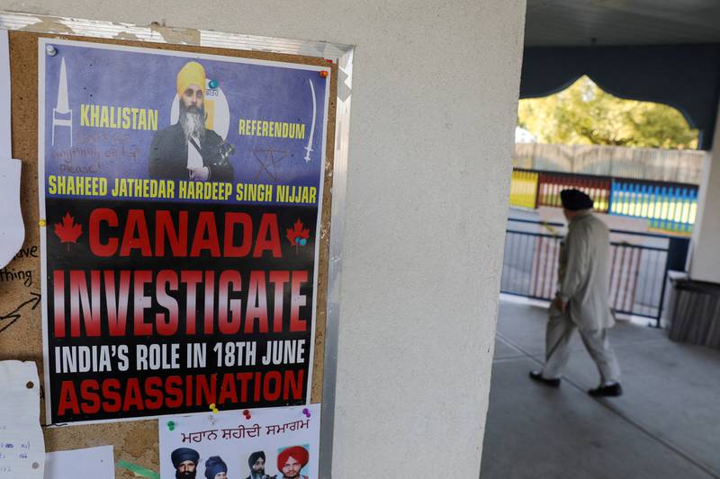 A sign asking for an investigation into India's role in the killing of Sikh leader Hardeep Singh Nijjar is seen at the Guru Nanak Sikh Gurdwara temple in Surrey, British Columbia, Canada. Reuters