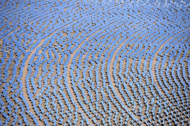 An aerial view of mirrors at the Ivanpah solar electric generating system, the largest solar thermal power tower system in the world. Ethan Miller / Getty Images / AFP