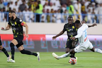 Al Ittihad's N'Golo Kante fights for the ball. AFP