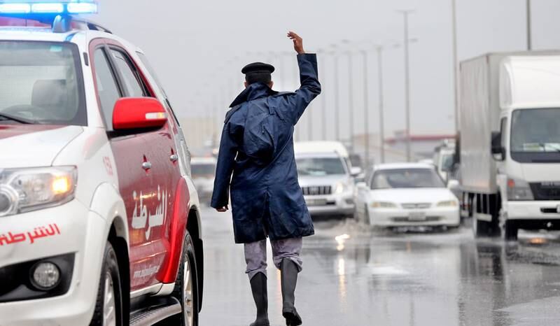 January 3, 2016 , Ras Al Khaimah UAE - The General command at RAK Police intensified police presence on various internal and external roads in the Emirate, to provide members of the public with assistance and ensure smooth traffic flow by towing and pulling out vehicles flooded by rainwater or stuck in valleys, in light of the rains that have poured on the UAE throughout the early hours of the morning.Courtesy RAK Police  *** Local Caption ***  B02U7193.JPG