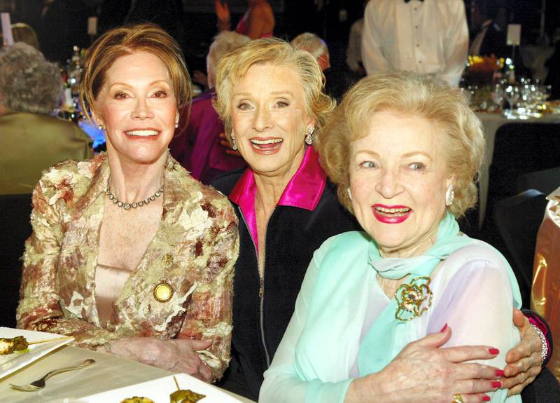 HOLLYWOOD, CA - MARCH 7:  Actresses (L-R) Mary Tyler Moore, Cloris Leachman, and Betty White on stage at the 2nd Annual TV Land Awards held at The Hollywood Palladium, March 7, 2004 in Hollywood, California.  (Photo by Kevin Winter/Getty Images)  *** Local Caption *** Mary Tyler Moore;Cloris Leachman;Betty White