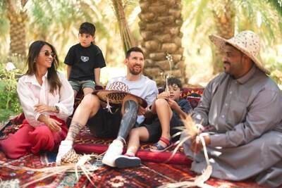 Lionel Messi, Saudi Tourism brand ambassador and his family being given some insider tips on the art of palm weaving. Photo: Saudi Tourism Authority