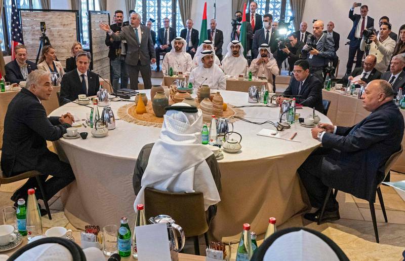 Mr Lapid, far left, delivers opening remarks during a roundtable with, from left, Mr Blinken; Sheikh Abdullah bin Zayed, Minister of Foreign Affairs and International Co-operation; and Nasser Bourita, Sameh Shoukry and Abdullatif Al Zayani, the foreign ministers of Morocco, Egypt and Bahrain, respectively. AFP