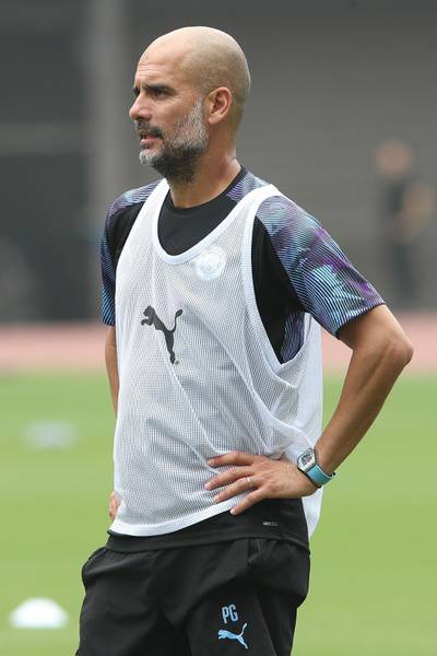 Pep Guardiola looks on during training. Getty