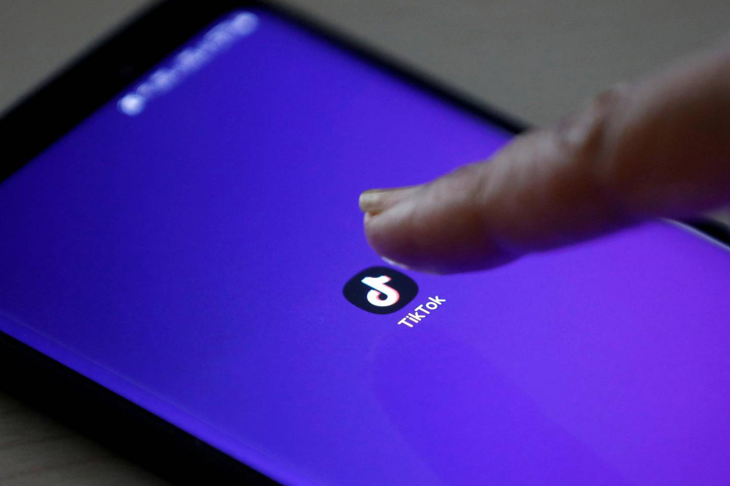 FILE PHOTO: The logo of the TikTok app is seen on a mobile phone screen in this picture illustration taken February 21, 2019. Picture taken February 21, 2019. REUTERS/Danish Siddiqui/Illustration/File Photo