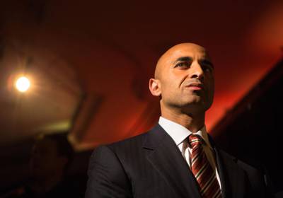 UAE Ambassador to the United States,  Yousef al Otaiba, prepares to walk on stage to accept the distinguished diplomatic service award, at the World Affairs Council Global Education Gala, in Washington, DC, March 7, 2013.