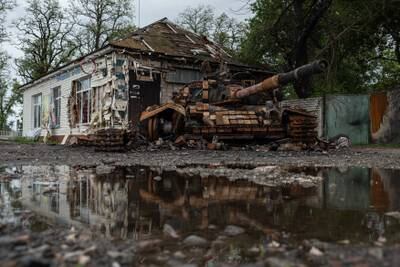 The burnt wreckage of a Ukrainian tank, in Kolychivka. Getty Images