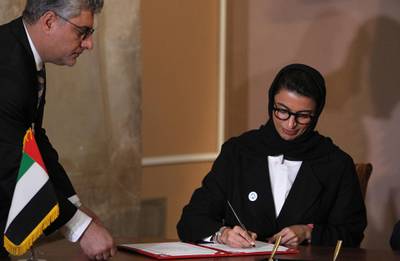 UAE Minister of Culture and Knowledge Development Noura al-Kaabi signs an agreement with Iraq's minister of culture and UNESCO on the reconstruction of Mosul's Al-Nuri mosque, on April 23, 2018 at the Iraqi National Museum in Baghdad. 
The United Arab Emirates and Iraq signed an agreement to develop the rehabilitation of the Al-Nuri Mosque and its Al-Hadba minaret in the former embattled Iraqi northern city of Mosul, with financial support amounting to 50.4 million dollars. The Nuri mosque and its ancient leaning minaret, were blown up in June 217 by jihadists of the Islamic State group as Iraqi forces battled to retake the city.  / AFP PHOTO / AHMAD AL-RUBAYE