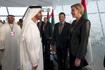 YAS ISLAND, ABU DHABI, UNITED ARAB EMIRATES - November 25, 2018: HH Sheikh Mohamed bin Zayed Al Nahyan, Crown Prince of Abu Dhabi and Deputy Supreme Commander of the UAE Armed Forces (L),  speaks with , HSH Princess Charlene of Monaco on the final day of the 2018 Formula 1 Etihad Airways Abu Dhabi Grand Prix, in Shams Tower.

( Ryan Carter / Ministry of Presidential Affairs )
---