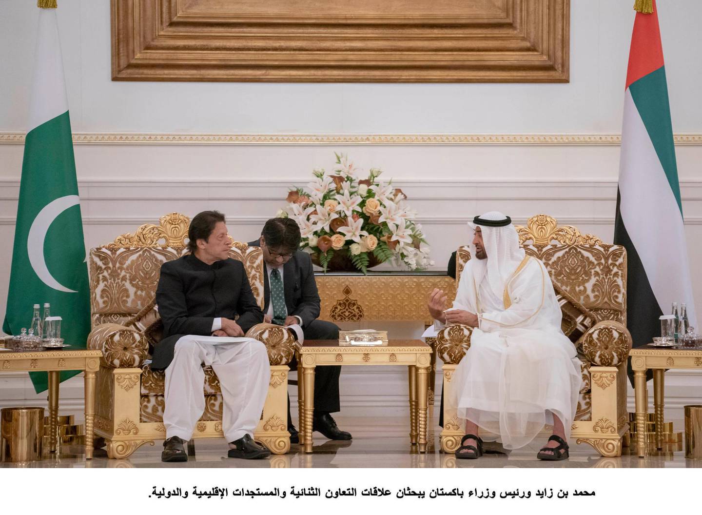 ABU DHABI, UNITED ARAB EMIRATES - September 19, 2018: HH Sheikh Mohamed bin Zayed Al Nahyan Crown Prince of Abu Dhabi Deputy Supreme Commander of the UAE Armed Forces (center R), receives HE Imran Khan Prime Minister of Pakistan (center L), during a reception at the Presidential Airport. ( Hamad Al Kaabi / Crown Prince Court - Abu Dhabi )---