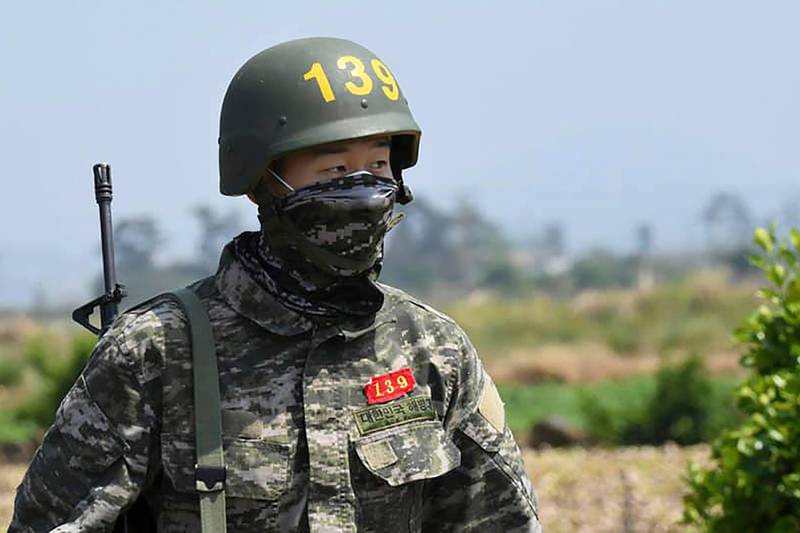 Son Heung-min marches alone during a drill at a Marine Corps boot camp in Seogwipo on Jeju Island.