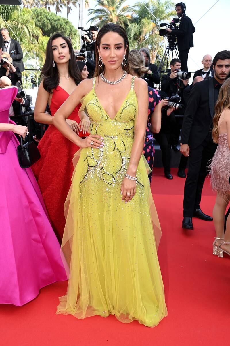 Bosnian influencer Tamara Kalinic wears yellow Elie Saab to attend the screening of 'Triangle of Sadness' on May 21. Getty Images