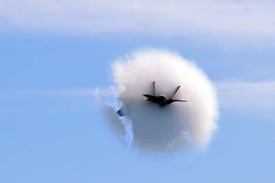 The moment a military aircraft passes through the speed of sound, creating a sonic boom. AFP