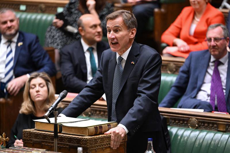 Britain's Chancellor Jeremy Hunt makes his autumn budget statement in the House of Commons. AFP