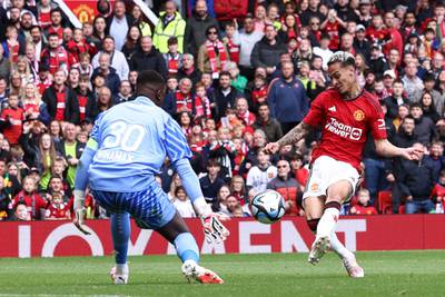 Manchester United's Brazilian midfielder Antony scores the second goal against Lens. AFP