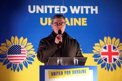 The Ukrainian ambassador to the UK, Vadym Prystaiko, addresses the London vigil. Reuters