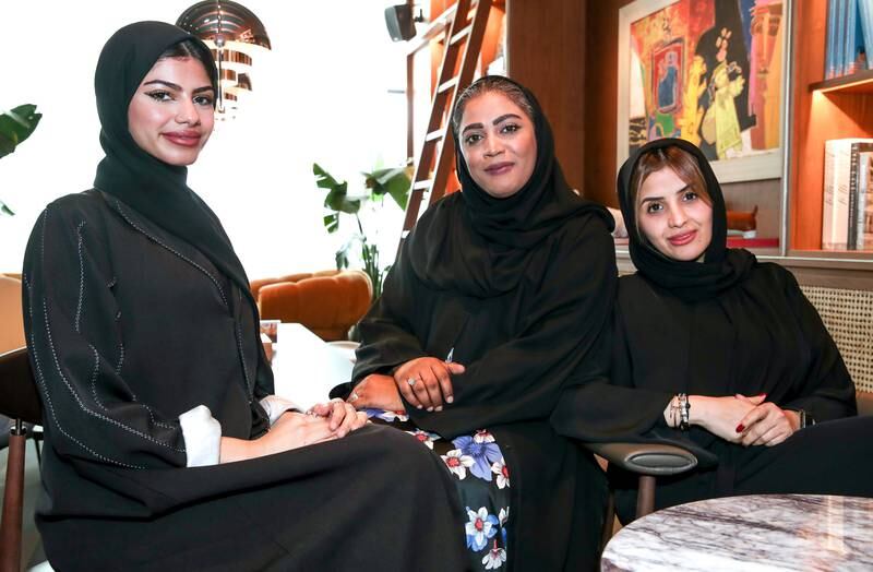 From left, Alya Al Zaabi, Badreya Al Ali and Sheikha Al Mheiri are proud of their jobs in the private sector. Victor Besa / The National