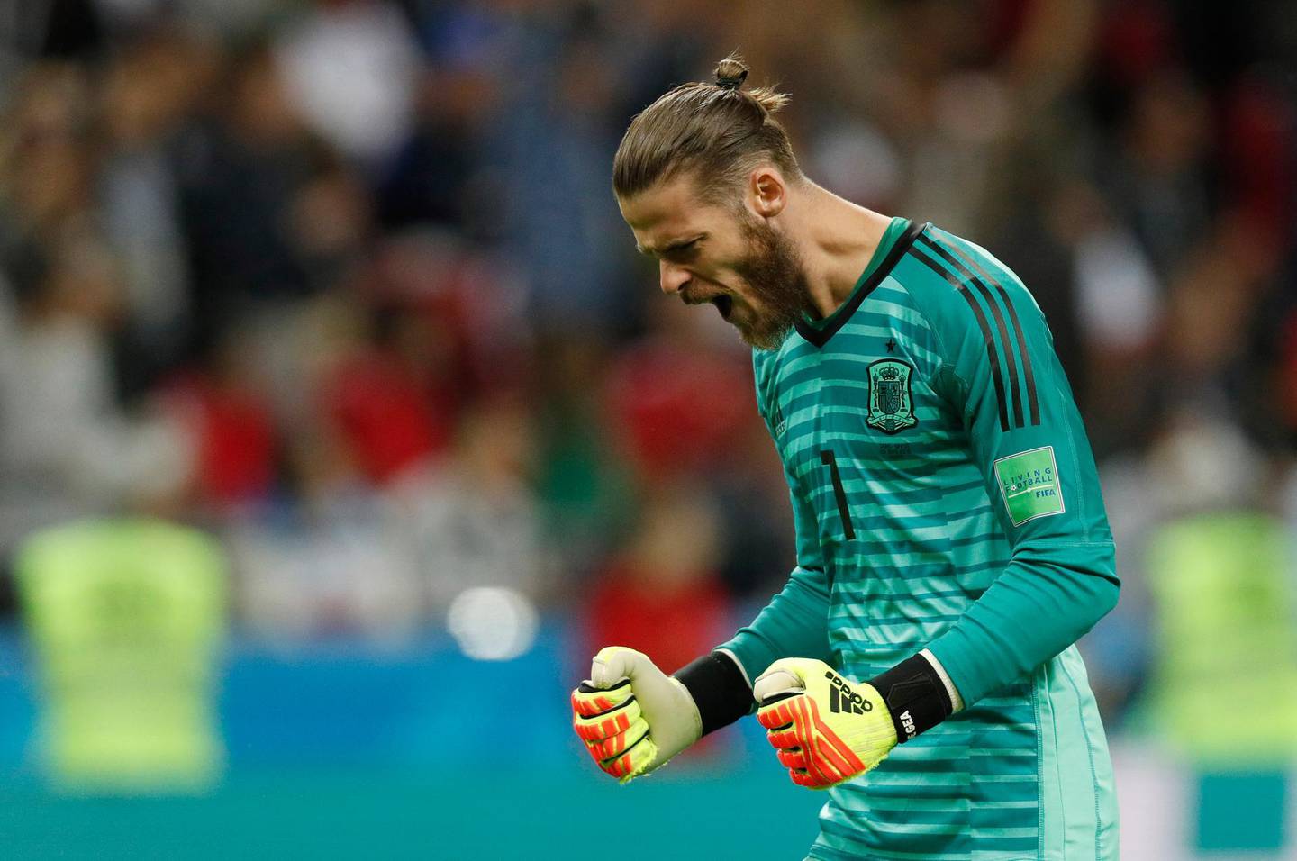 epa06825578 Goalkeeper David de Gea of Spain celebrates the 1-0 lead during the FIFA World Cup 2018 group B preliminary round soccer match between Iran and Spain in Kazan, Russia, 20 June 2018.

(RESTRICTIONS APPLY: Editorial Use Only, not used in association with any commercial entity - Images must not be used in any form of alert service or push service of any kind including via mobile alert services, downloads to mobile devices or MMS messaging - Images must appear as still images and must not emulate match action video footage - No alteration is made to, and no text or image is superimposed over, any published image which: (a) intentionally obscures or removes a sponsor identification image; or (b) adds or overlays the commercial identification of any third party which is not officially associated with the FIFA World Cup)  EPA/ROBERT GHEMENT   EDITORIAL USE ONLY