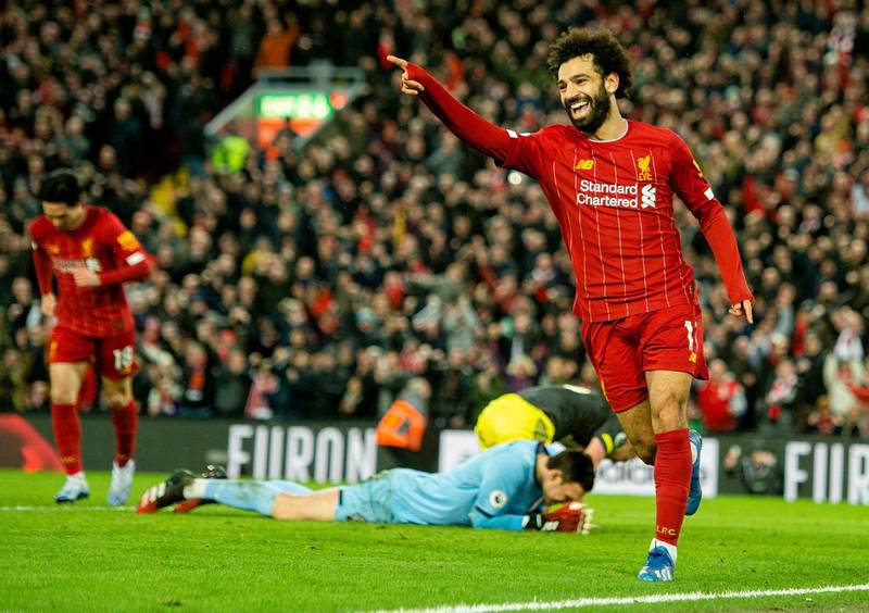 epa08185563 Liverpool's Mohamed Salah celebrates after scoring the fourth goal making the score 4-0 during the English Premier League soccer match between Liverpool and Southampton at Anfield, Liverpool, Britain, 01 February 2020.  EPA/PETER POWELL EDITORIAL USE ONLY. No use with unauthorized audio, video, data, fixture lists, club/league logos or 'live' services. Online in-match use limited to 120 images, no video emulation. No use in betting, games or single club/league/player publications