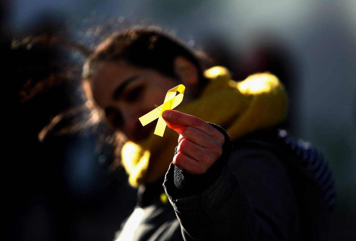 LONDON, ENGLAND - FEBRUARY 25:  Yellow ribbons in support of in support of Catalan independence are handed out before the Carabao Cup Final between Arsenal and Manchester City at Wembley Stadium on February 25, 2018 in London, England. (Photo by Catherine Ivill/Getty Images)