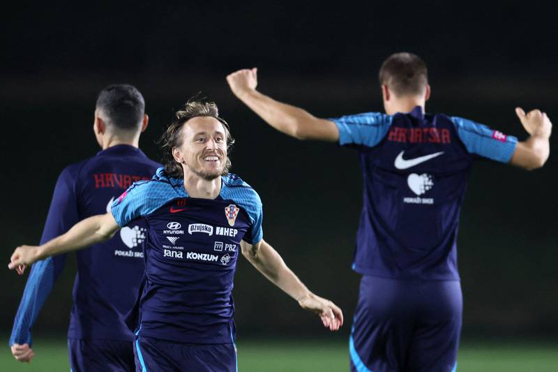 Croatia's midfielder Luka Modric takes part in a training session at Al Erssal training centre ahead of their third place play-off against Morocco at World Cup 2022. AFP