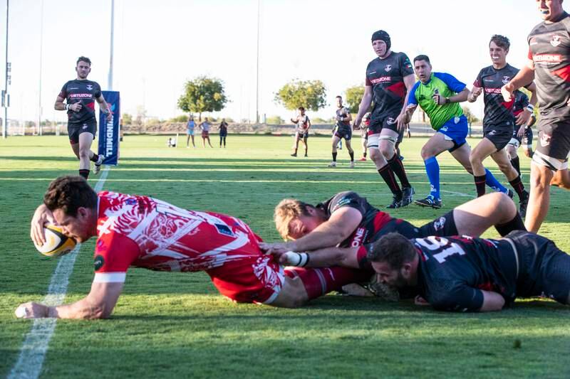 Clint Eadie of Dubai Tigers taps down for a try furing the UAE Premiership final.