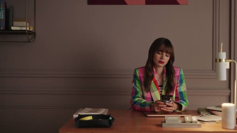 Lily Collins's character sports a fringe in season three of Netflix's Emily in Paris. Photo: Netflix
