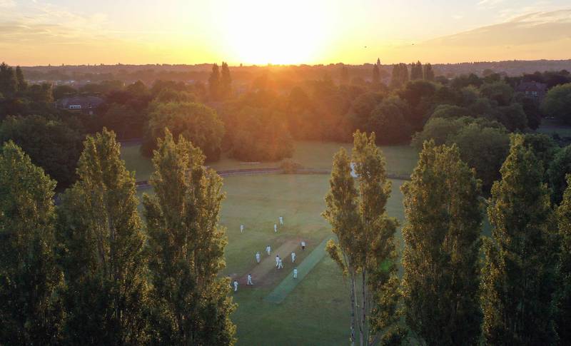 The solstice cricket match between teams from Sefton Park Cricket Club in Liverpool, north-west England.  The first ball was bowled at sunrise, at 4:43am. AFP