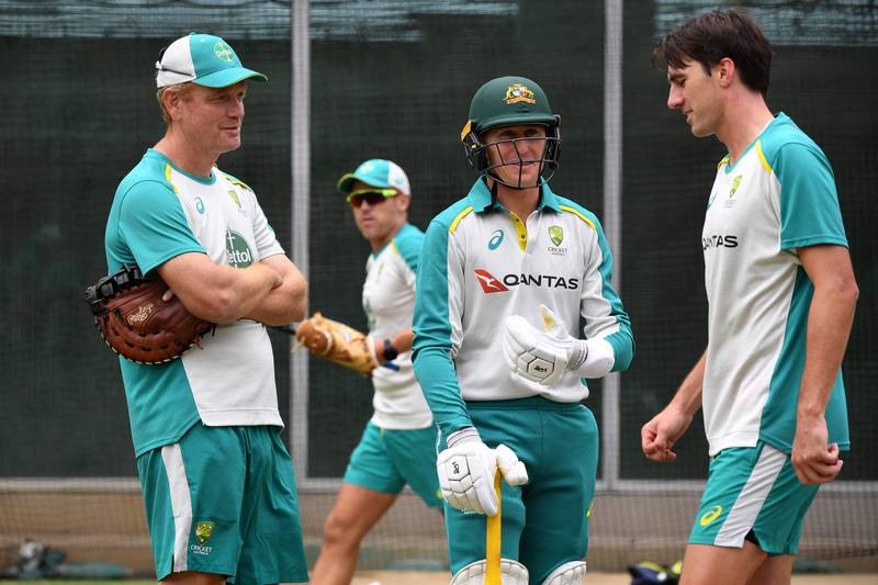 Australia captain Pat Cummins, coach Andrew McDonald and Marnus Labuschagne during the final practice session at the Melbourne Cricket Ground before their departure for the team's first tour of Pakistan since 1998. AFP