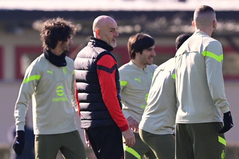 AC Milan's Italian coach Stefano Pioli supervises a training session on February 13, 2023 at the Milanello Sports Center in Carnago, northwest of Milan, on the eve of the UEFA Champions League round of 16 football match between AC Milan and Tottenham Hotspur.  (Photo by Marco BERTORELLO  /  AFP)