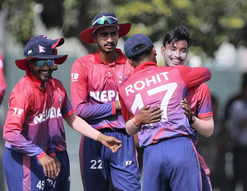 Dubai, United Arab Emirates - January 26, 2019: Sompal Kami of the Nepal takes the wicket of Shaiman Anwar of the UAE in the the match between the UAE and Nepal in a one day internationl. Saturday, January 26th, 2019 at ICC, Dubai. Chris Whiteoak/The National