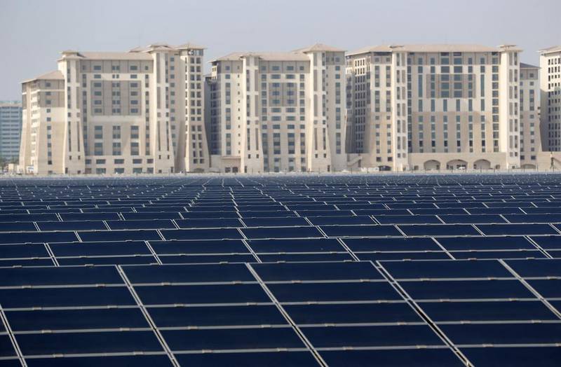 A solar farm on the outskirts of Masdar City, Abu Dhabi. Karim Sahib / AFP