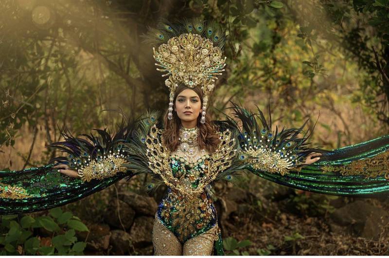 For her national costume, which won the award for the most exotic costume, Koushal wore a dazzling outfit inspired by the peacock, the national bird of India, by Indonesian artist and designer Eggie Jasmin