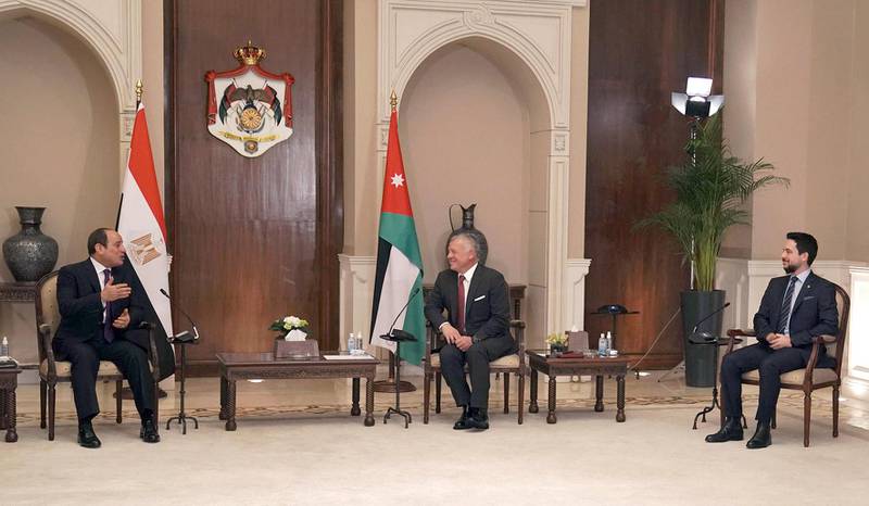 A handout picture released by the Jordanian Royal Palace on January 18, 2021 shows Jordanian King Abduallah II (C) and Crown Prince Hussein (R) meeting with Egypt's President Abdel Fattah al-Sisi in the capital Amman.  - RESTRICTED TO EDITORIAL USE - MANDATORY CREDIT "AFP PHOTO / JORDANIAN ROYAL PALACE / YOUSEF ALLAN" - NO MARKETING NO ADVERTISING CAMPAIGNS - DISTRIBUTED AS A SERVICE TO CLIENTS
 / AFP / Jordanian Royal Palace / Yousef ALLAN / RESTRICTED TO EDITORIAL USE - MANDATORY CREDIT "AFP PHOTO / JORDANIAN ROYAL PALACE / YOUSEF ALLAN" - NO MARKETING NO ADVERTISING CAMPAIGNS - DISTRIBUTED AS A SERVICE TO CLIENTS
