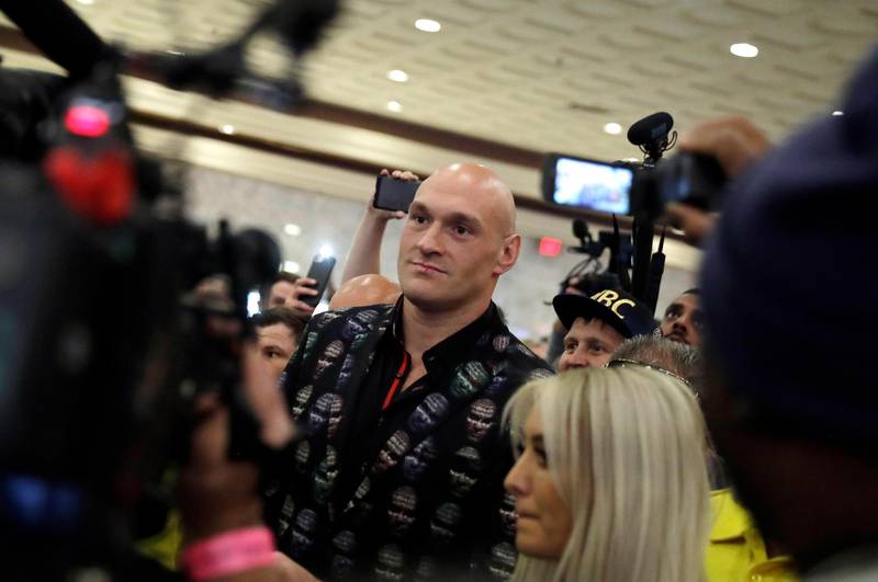 Tyson Fury and his wife arriving. AP Photo