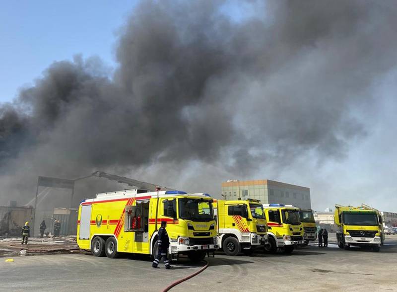 Firefighters at the scene of the blaze in Abu Dhabi's Mussaffah industrial area. Photo: Abu Dhabi Police
