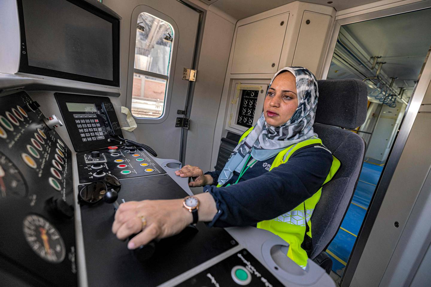 Hind Omar pilots a train simulator at Adly Mansour station in Cairo's suburb of Heliopolis in May. AFP