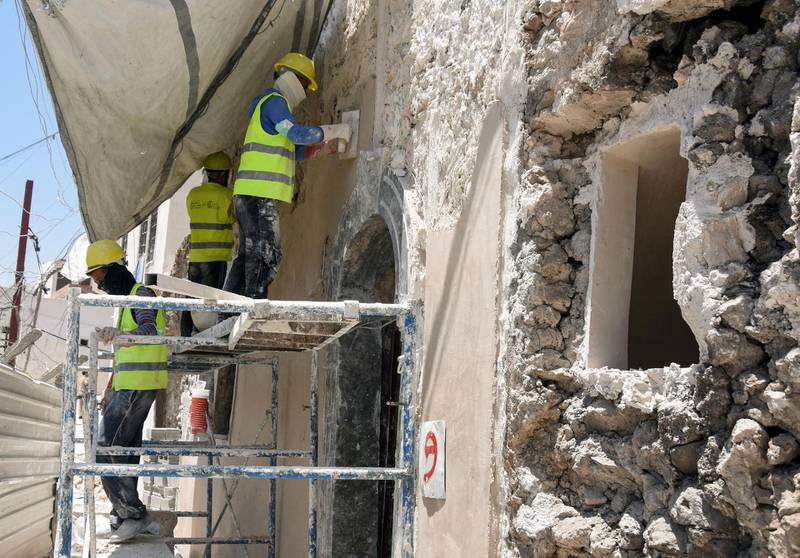 Plasterers restoring the Old City of Mosul. The project employs more that 600 locals and is set to exceed a target of 1,000 employment and training opportunities by its conclusion in 2023, said UAE Minister for Culture and Youth Noura Al Kaabi. Reuters