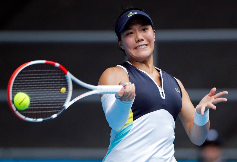 United States' Kristie Ahn makes a forehand return to Denmark's Caroline Wozniacki during their first round singles match at the Australian Open tennis championship in Melbourne, Australia, Monday, Jan. 20, 2020. (AP Photo/Andy Wong)