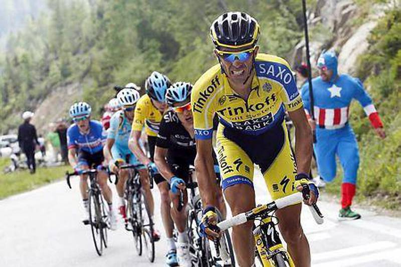 Spanish rider Alberto Contador crashed out of the Tour de France, but on Thursday he announced he will compete in next month's Vuelta a Espana (Tour of Spain). Contador quit the Tour de France, which he had been bidding to win for a third time, after suffering a fractured shinbone on the tough 10th stage. AFP PHOTO