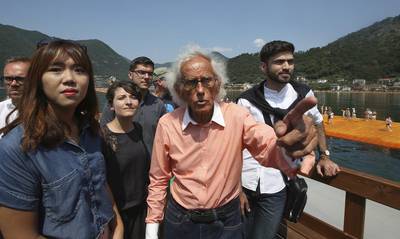 Artist Christo with a group of students from the UAE at his installation The Floating Piers on Lake Iseo in Italy. Luca Bruno / AP Photo