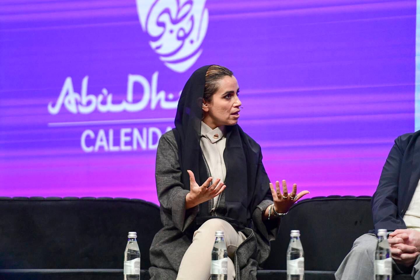 Alia Al Shamsi, cultural programming manager at Louvre Abu Dhabi, speaks during the Department of Culture and Tourism Live Talk Show at Manarat Al Saadiyat. Khushnum Bhandari / The National