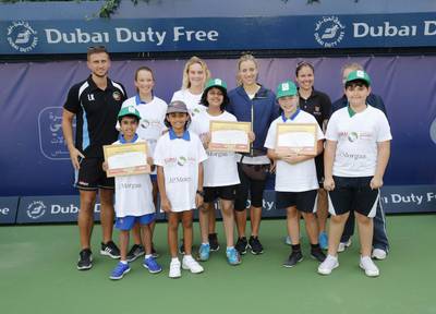 Angelique Kerber with Partner Schools Proramme representtaives. Courtesy Dubai Duty Free Tennis Championships