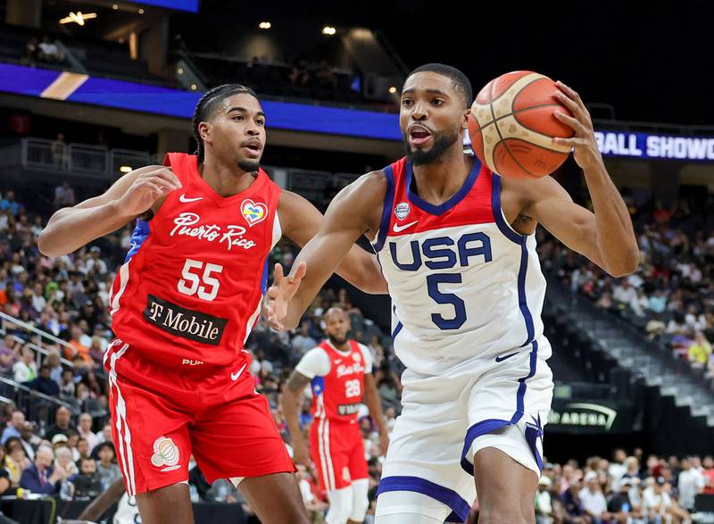 Team USA's Mikal Bridges in action against Ethan Thompson of Puerto Rico during the Fiba World Cup warm-up game at T-Mobile Arena in Las Vegas, Nevada, on August 07, 2023. AFP