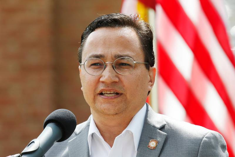 FILE - In this Aug. 22, 2019 file photo, Cherokee Nation Principal Chief Chuck Hoskin Jr., speaks during a news conference in Tahlequah, Okla. The chief of the Cherokee Nation says it's time for auto maker Jeep to stop using the tribe's name on its Cherokee and Grand Cherokee models. Chief Chuck Hoskin Jr. said in a statement he believes corporations and team sports should stop using Native American names, images and mascots on their teams and products. (AP Photo/Sue Ogrocki, File)