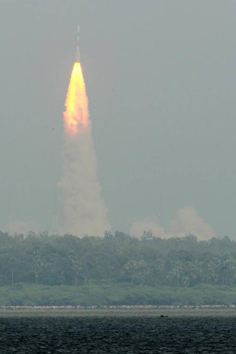 The PSLV-C25 launch vehicle, carrying the Mars Orbiter probe as its payload, lifts off from the Satish Dhawan Space Centre in Sriharikota. Seshadri Sukumar / AFP





