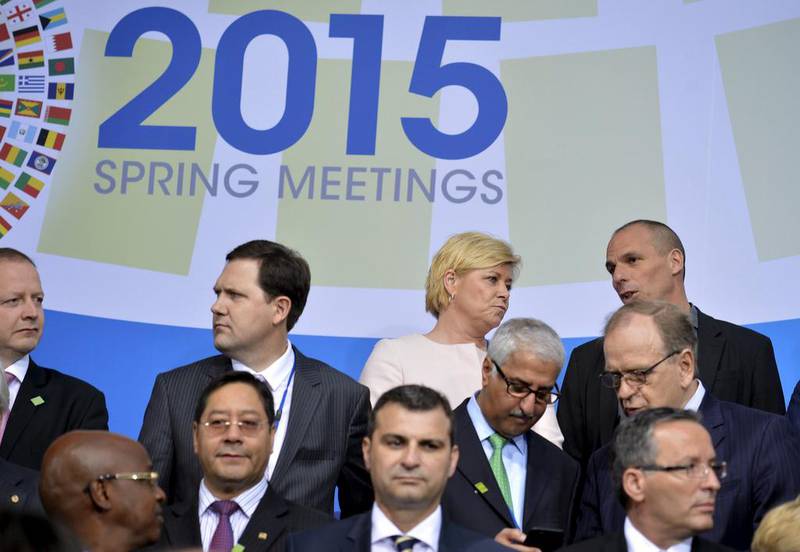 The Greek finance minister Yanis Varoufakis (top right) takes his place for a group photo of International Monetary and Financial Committee (IMFC) governors, during the IMF and World Bank's 2015 Annual Spring Meetings, in Washington on April 18, 2015. Mike Theiler / Reuters