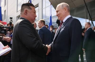 Russian President Vladimir Putin shakes hands with North Korean leader Kim Jong-un during a meeting at the Vostochny Сosmodrome in Russia's far-eastern Amur region on Wednesday. Reuters